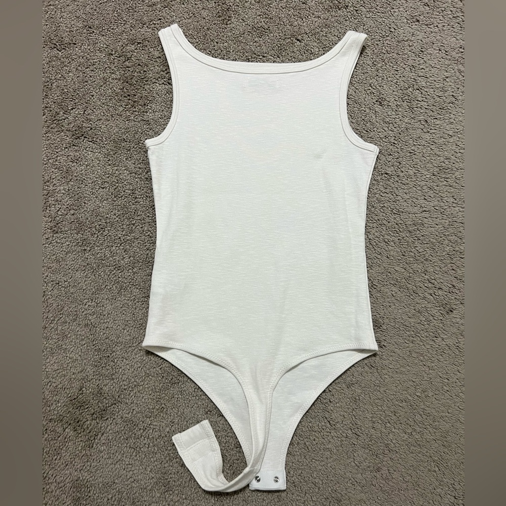 White free assembly boat neck bodysuit